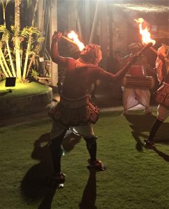 Performers eating fire at the reception
